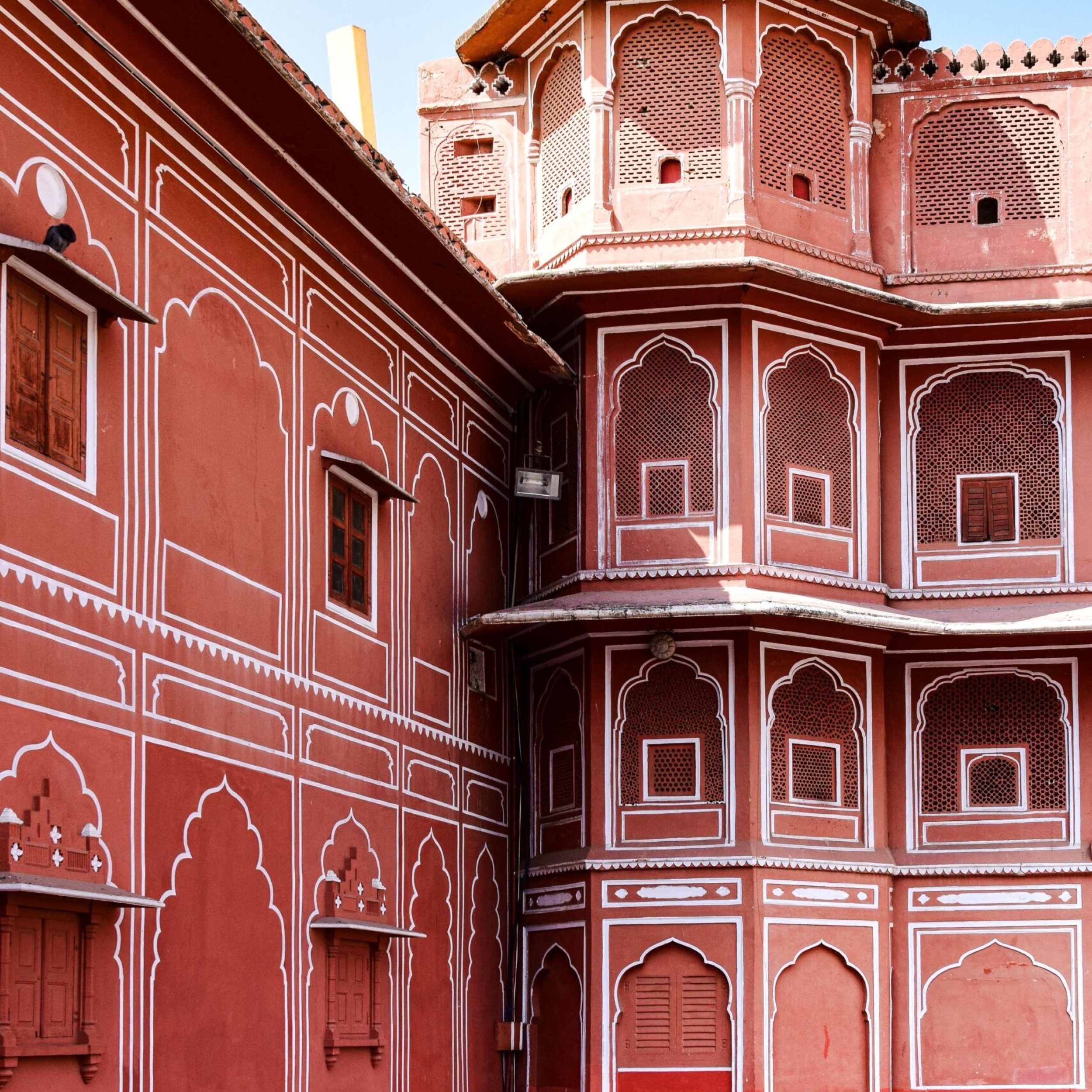 Explore the intricate designs of the iconic City Palace in Jaipur, India, captured in vibrant detail.